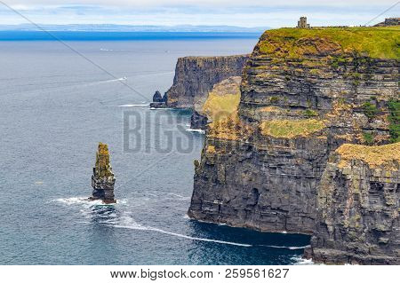 Caslte Tower And Rocks In Cliffs Of Moher