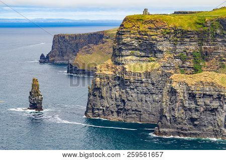 Caslte Tower And Rocks In Cliffs Of Moher