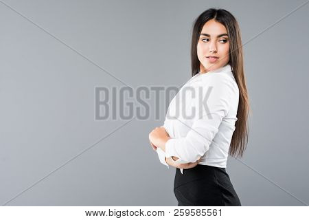 Closeup Profile Of Confident Business Woman Looking Forward On Gray Background