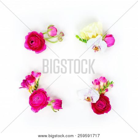 Flowers Composition. Frame Made Of Ranunculus And Orchidea Flowers On White Background. Flat Lay Sce