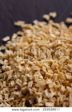 Fragrant Dried Parsnip On A Dark Stone Background