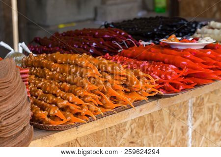 Delicious Georgian Sweetness Churchchel On The Marketplace. Oriental Sweets In The Bazaar.