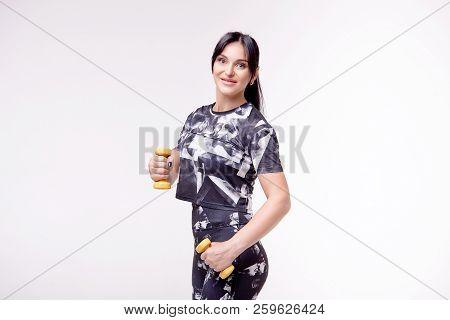 Beautiful Athletic Woman Wearing In Sports Style Clothing Makes Sports Exercis .