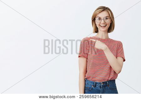 You Should Meet This Guy. Portrait Of Happy Friendly-looking Blonde In Glasses And Striped T-shirt, 