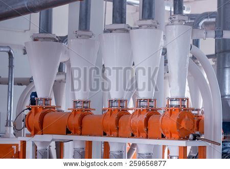 Plant For The Production Of Food Flour, A Lot Of Metal Pipes Through Which Food Flour Passes, Breads
