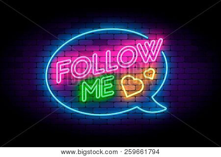 Follow Me Neon Sign On The Brick Wall With Hearts And Speech Bub