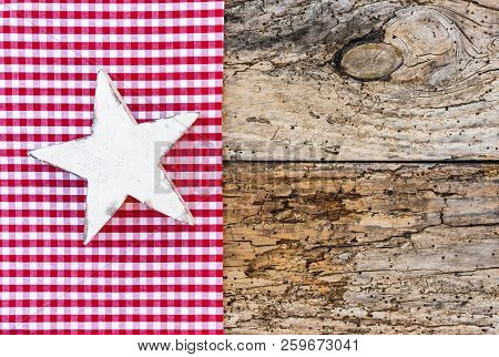 White Christmas Star Ornament On Rustic Background, Copy Space