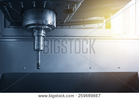 The  Cnc Milling Machine  With The Index-able Ball End Mill In The Light Blue Scene .the Hi-technolo
