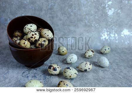 Group Of Quail Egg In Cup On Cement Background