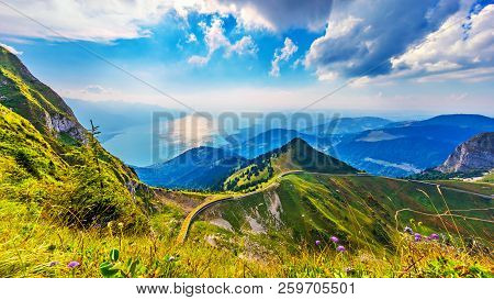 Scenic Summer Panorama From Rochers De Naye Mountain Peak With Green Grassy Hills, Flower Meadows An