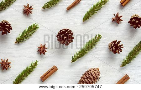 Christmas Composition. Winter Pattern Made Of Spices, Pine And Fir Cones, Cinnamon Sticks, Anise Sta