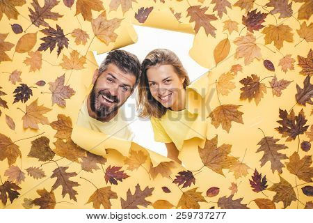 Autumn Couple Wearing In Autumn Clothes And Looks Very Sensually. Romantic Couple Wearing Pullover O
