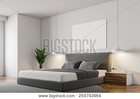 White Wall Minimalistic Bedroom Corner With A Wooden Floor, A Grey Carpet With Masterbed Standing On