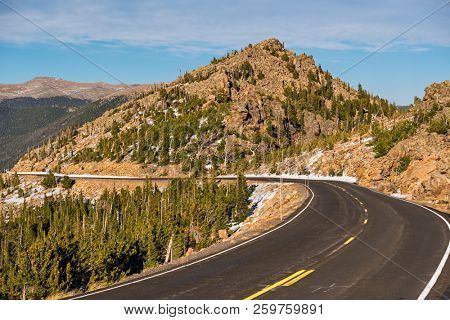 Trail Ridge Road, the highest (12,183 feet) continuous highway in the USA in high alpine tundra with rocks and mountains at autumn. Rocky Mountain National Park in Colorado, USA. 