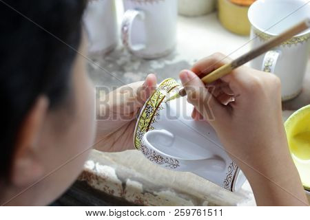 Artist Painting Benjarong Ceramic Ware