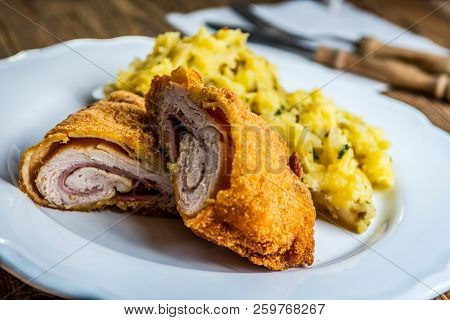 Traditional French Cuisine Chicken Roll Cordon Bleu Or Gordon Blue With Cheese, Ham And Mashed Potat