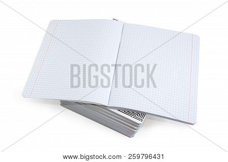 Open Blank Exercise Book With Pages Of Squared Paper And Red Vertical Lines For A Margins On A Stack