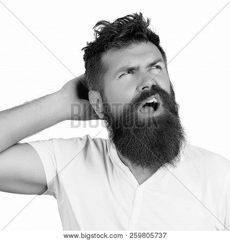 Headshot Of Clueless Perplexed Bearded Man In White T-shirt Looking Up And Open Mouth With Confused 