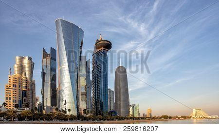 DOHA, QATAR - 31 January 2016: Skyscrapers in the Dafna district of Doha t sunset, with the Sheraton hotel on the right,