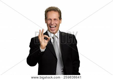 Portrait Of Businessman Showing Ok Sign. Happy Excited Company Leader Making Okay Sign With Fingers,