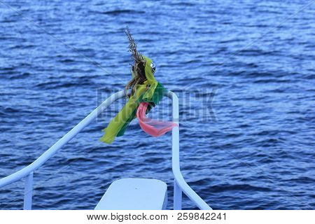 Three Colored Cloth Tied To The Boat.