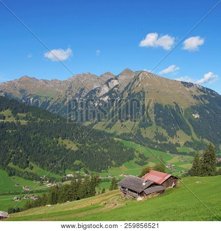 Landscape Near Gstaad, Switzerland. Mount Primelod. Summer Day.