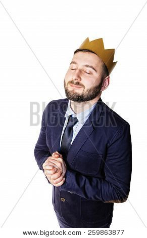 The Concept Of Leadership, Excellence. Portrait Of A Smiling Man With A Golden Crown On His Head. Is