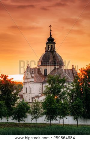 Nesvizh, Minsk Region, Belarus. Corpus Christi Church In Summer Sunset Evening. Famous Landmark In N