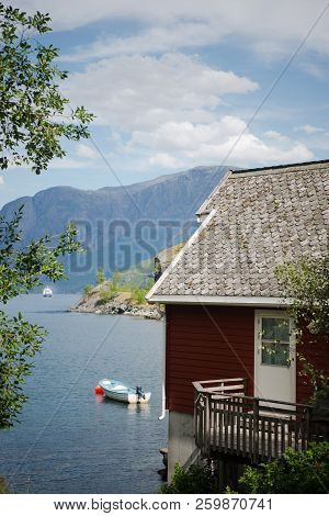 Wooden House And Mountains On Coast Of Beautiful Aurlandsfjord, Flam Aurlandsfjorden , Norway
