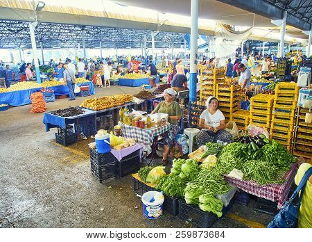 Bodrum, Turkey - July 6, 2018. Citizens shopping in Bodrum market, Kapali Pazar Yeri, at downtown. Mugla Province, Turkey.