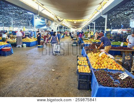 Bodrum, Turkey - July 6, 2018. Citizens shopping in Bodrum market, Kapali Pazar Yeri, at downtown. Mugla Province, Turkey.