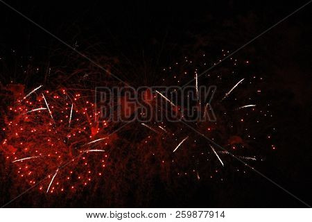 The Celebration Colored Firework Flashing In The Black Night Sky