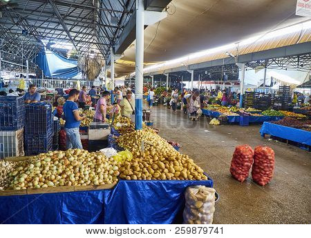 Bodrum, Turkey - July 6, 2018. Citizens shopping in Bodrum market, Kapali Pazar Yeri, at downtown. Mugla Province, Turkey.