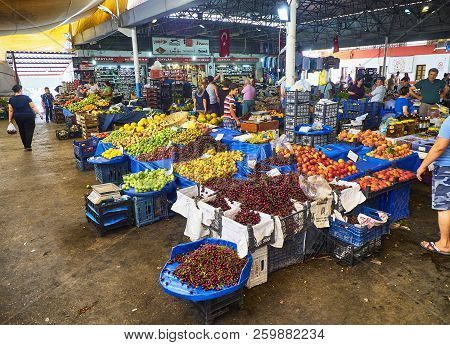 Bodrum, Turkey - July 6, 2018. Citizens shopping in Bodrum market, Kapali Pazar Yeri, at downtown. Mugla Province, Turkey.