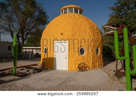 July 10 2018 - Cartago, California: The Landmark Roadside Attraction Big Yellow Dome House Sits Aban