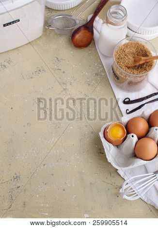 Background With Baking Ingredients Eggs Sugar Vanilla Flout Kitchen Utensils Top View, Copy Space