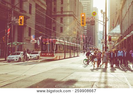 Toronto, Canada - September 17, 2018: Rush Hour At Toronto Downtown, Many People On The Street. Suns