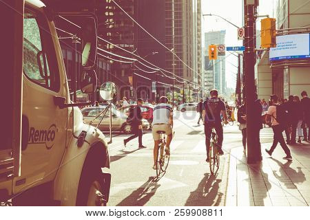 Toronto, Canada - September 17, 2018: Rush Hour At Toronto Downtown, Many People On The Street. Suns