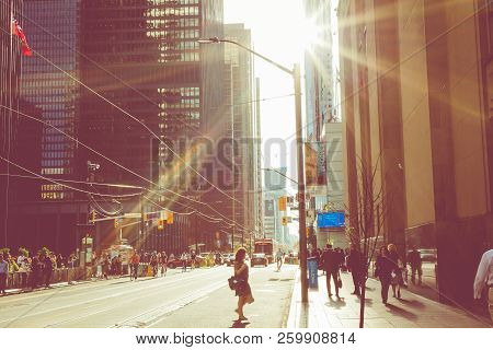 Toronto, Canada - September 17, 2018: Rush Hour At Toronto Downtown, Many People On The Street. Suns