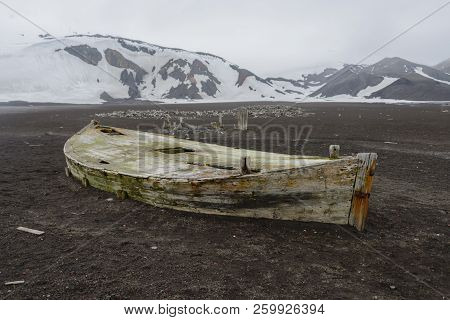 Old Wooden Boat On The Beach On Deception Island, Antarctica