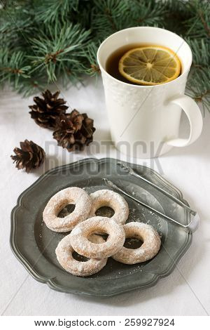 Traditional Romanian Or Moldovan Cookies From Shortcrust Pastry And A Cup Of Tea On A Background Of 
