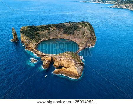 Top view of Islet of Vila Franca do Campo is formed by the crater of an old underwater volcano near San Miguel island, Azores archipelago, Portugal.