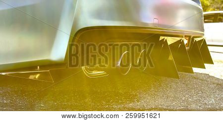 Customized Car With Dual Exhaust And Tail Spikes