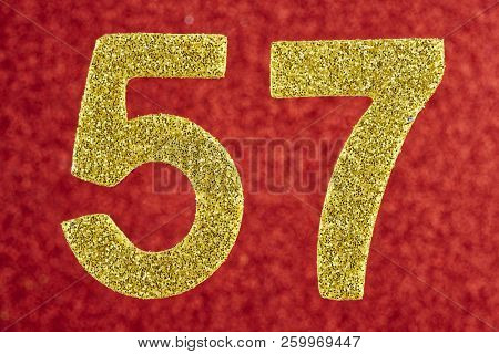 Number Fifty-seven Gold Color Over A Red Background. Anniversary. Horizontal