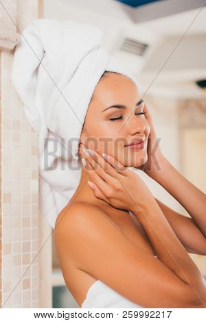 Beautiful Woman In White Bath Robe With Perfect Clean Face