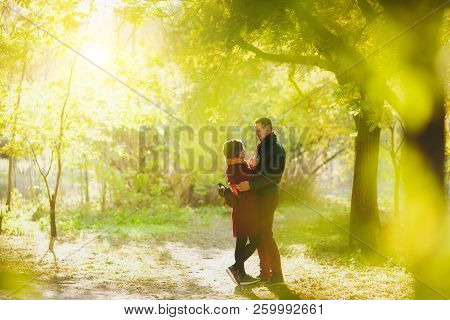 Young Couple In Love, Attractive Woman And Man In Casual Warm Clothes Hugging Embracing And Looking 
