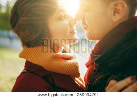 Cropped Image Young Romantic Couple Woman Man In Casual Clothes Embracing Hugging Looking At Each Ot