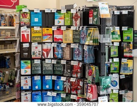 San Francisco, California March 16, 2019: Gift Card Stand In Convenience Store With Apple, Google, D