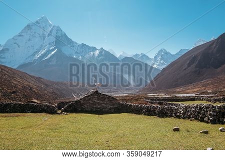 Picturesque View Of Green Grass Lawn Pasture Near The Pheriche Village In The Khumbu Region Of Easte