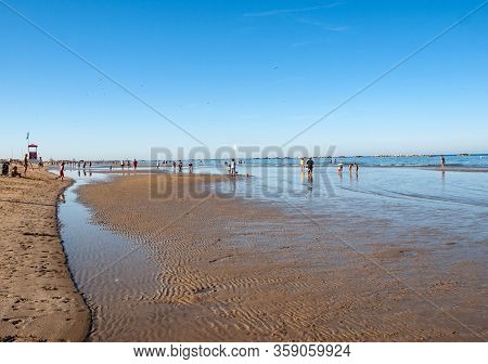 Cesenatico, Emilia Romagna, Italy - Sept 13 2019: People Are Resting On A Sunny Day At The Beach In 